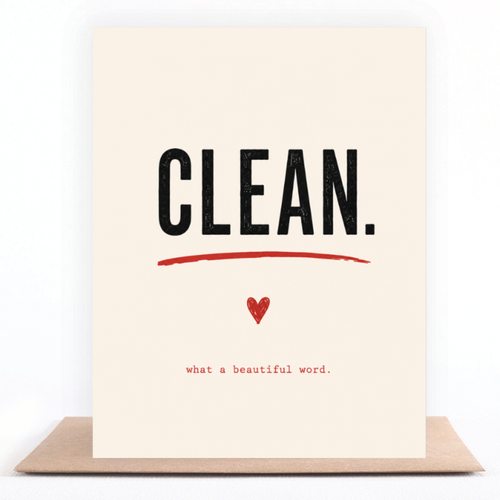 Clean greeting card standing on a kraft envelope