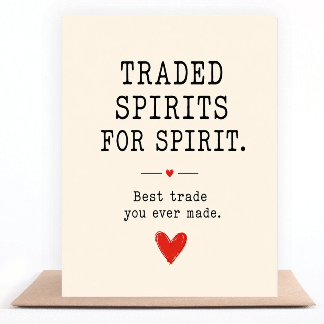 Traded Spirits for Spirit greeting card standing on a kraft envelope
