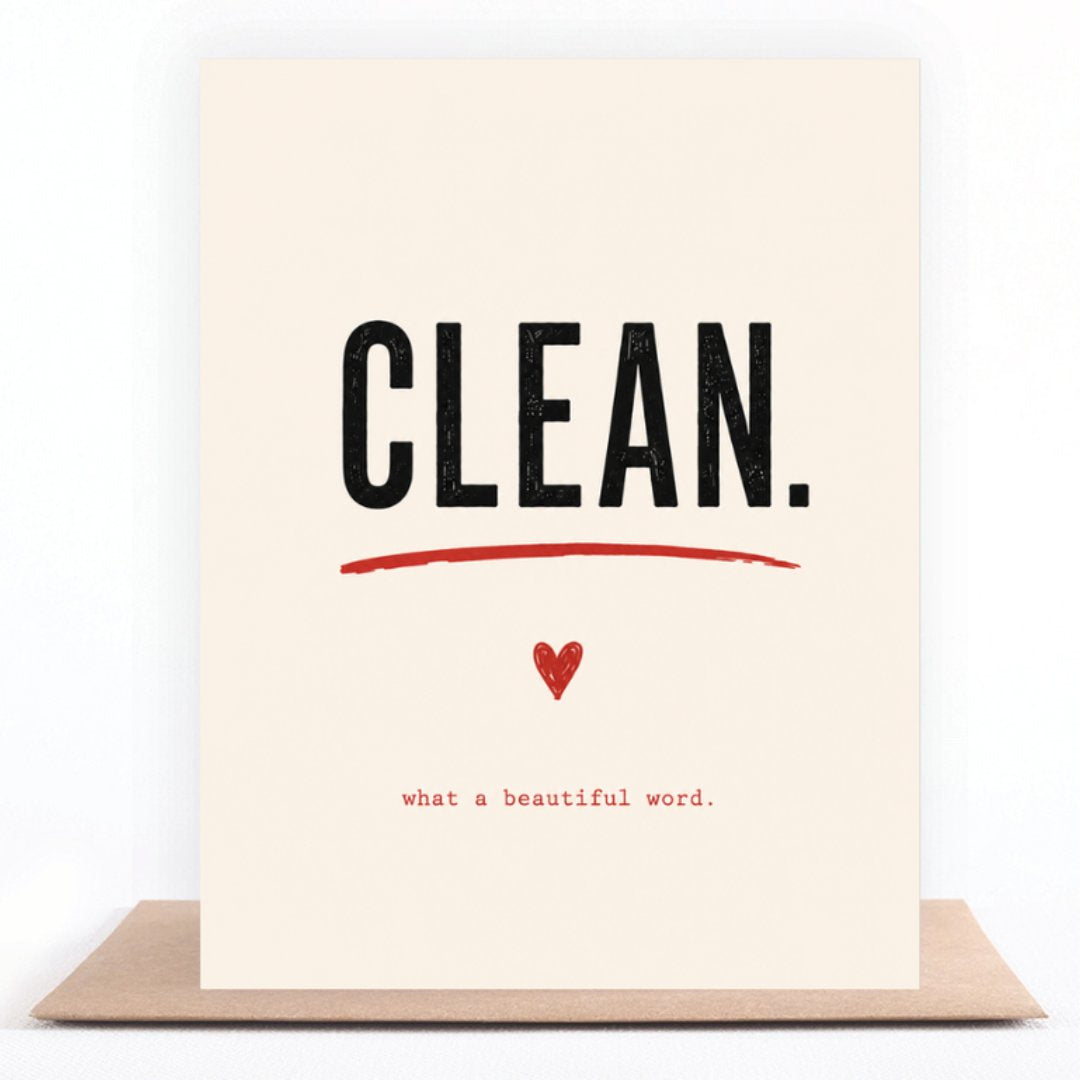 Clean greeting card standing on a kraft envelope