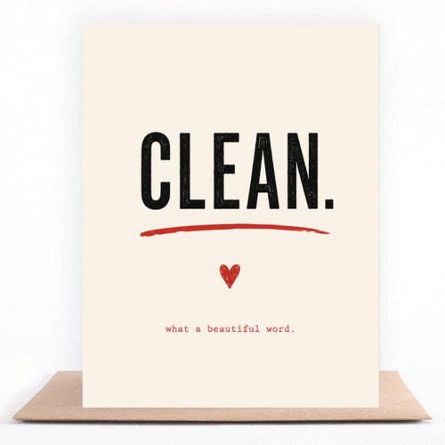 Clean greeting card standing on a kraft envelope