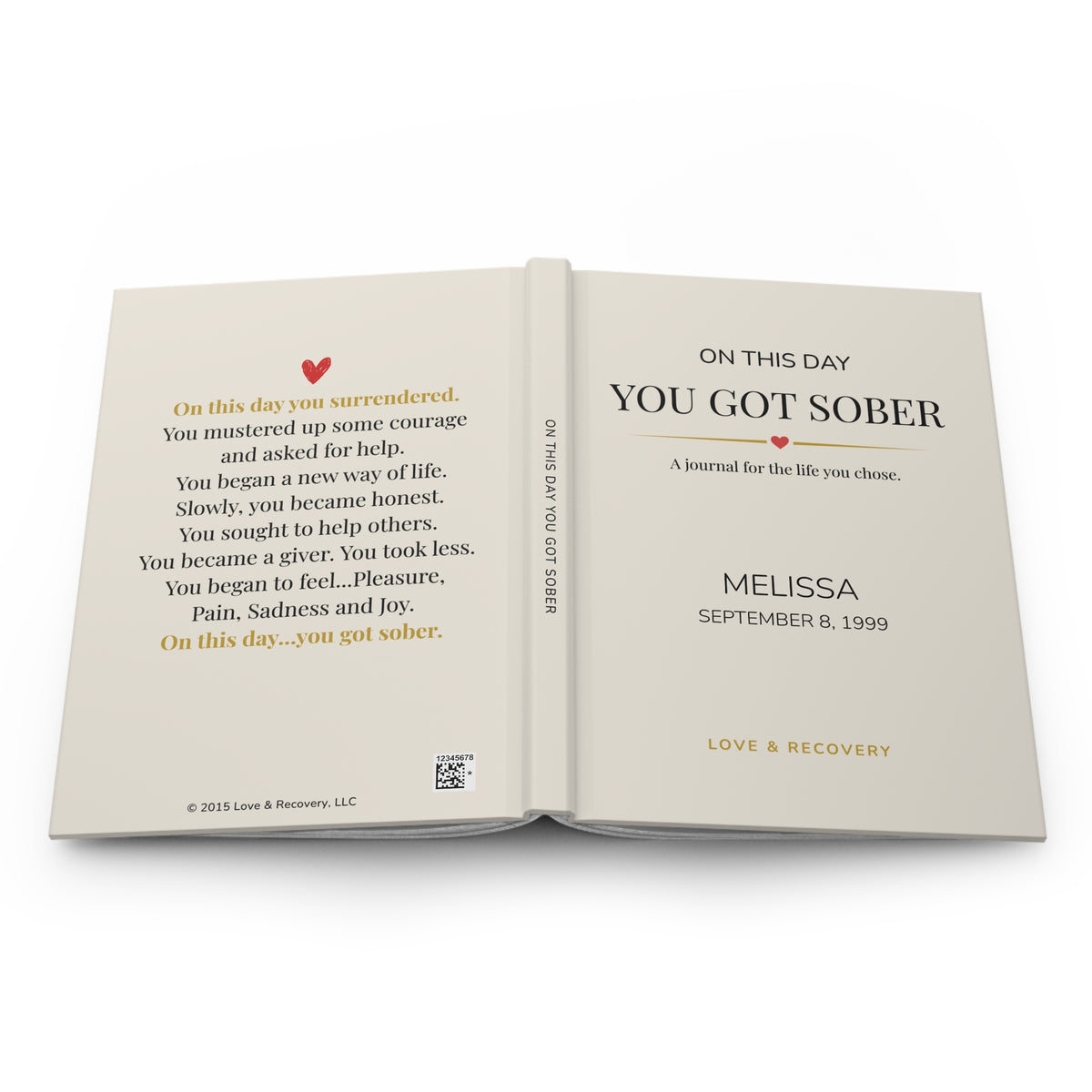 Personalized sobriety journal opened flat to show the front cover, spine and back-cover poem