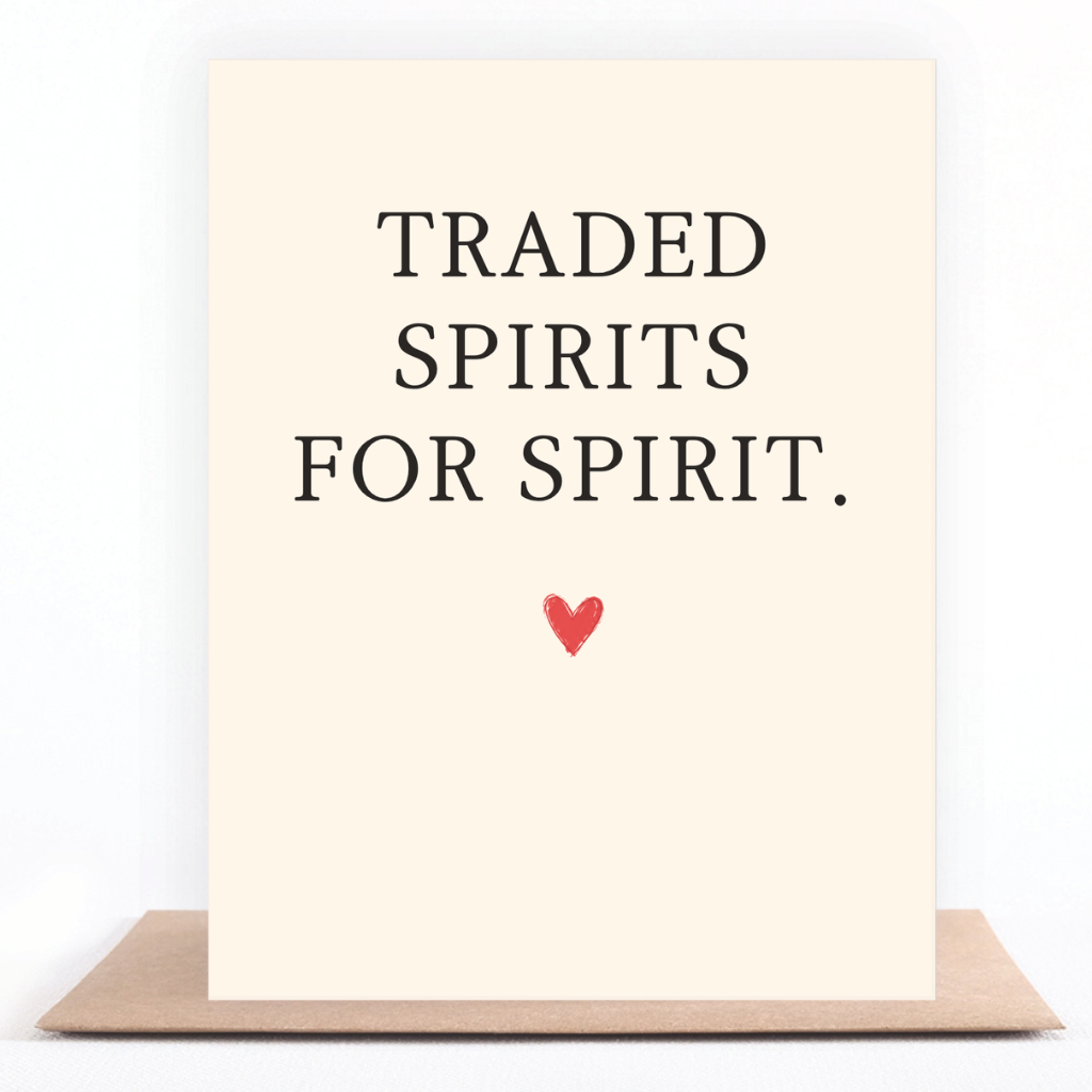 Traded Spirits for Spirit greeting card standing on a kraft envelope