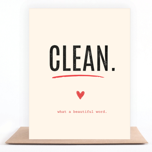 A vertical cream-colored greeting card with the word 'CLEAN.' in large black letters, underlined in red, with a small red heart and the phrase 'what a beautiful word.