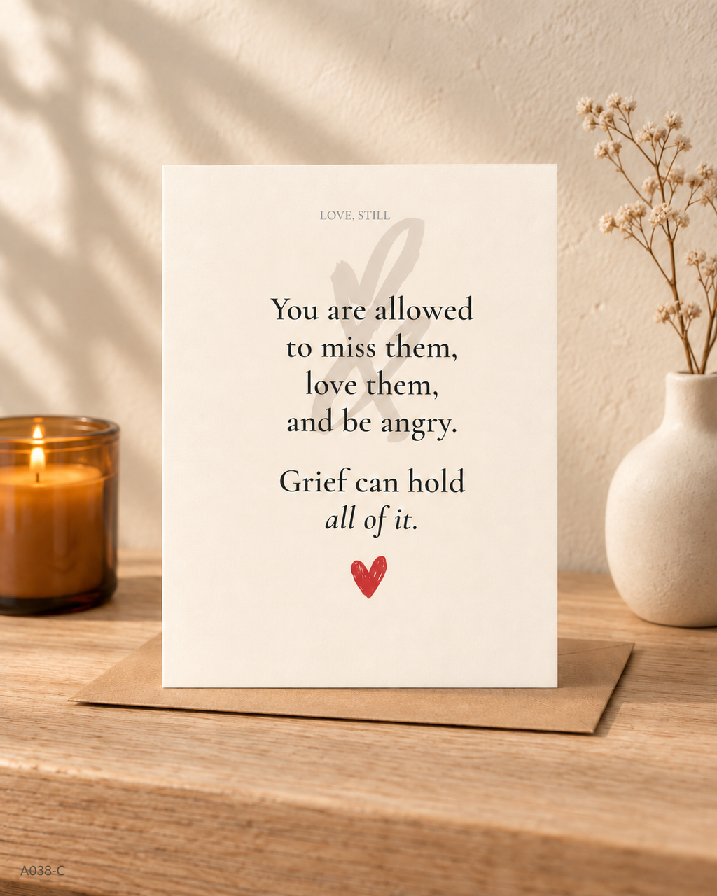 Grief Can Hold All of It sympathy card styled with kraft envelope, validating mixed grief emotions