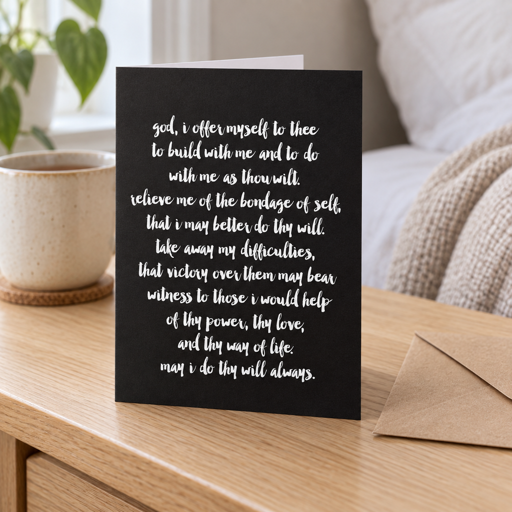 Close-up of Third Step Prayer text on black A2 recovery greeting card