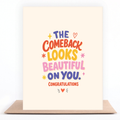 Colorful congratulations card reading “The Comeback Looks Beautiful on You” displayed with a kraft envelope.
