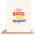 Colorful pink, orange, yellow, and purple sobriety card reading “No Booze. All Personality.” displayed with a kraft envelope.