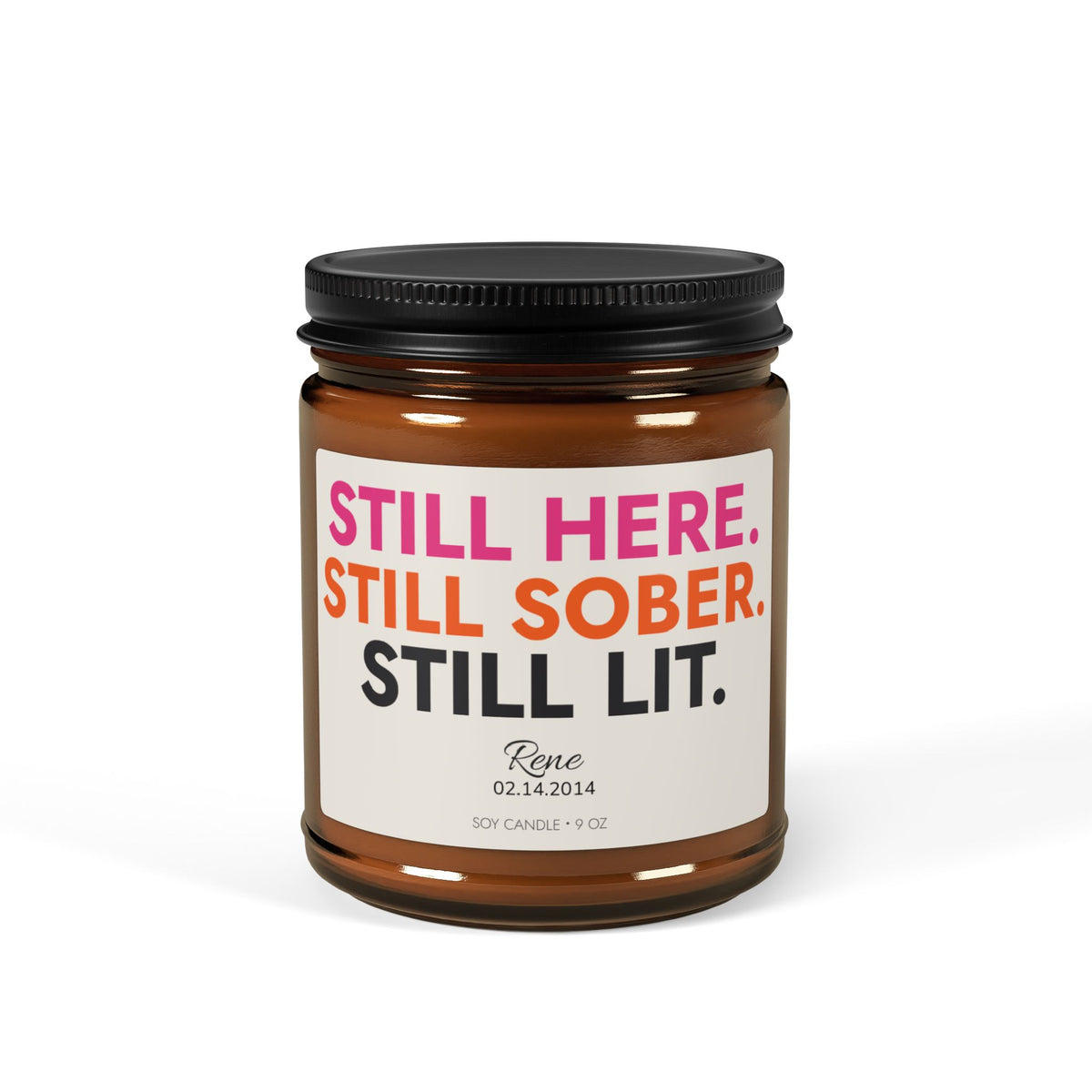 Personalized sobriety candle in a 9 oz amber jar with custom name and sobriety date, front view