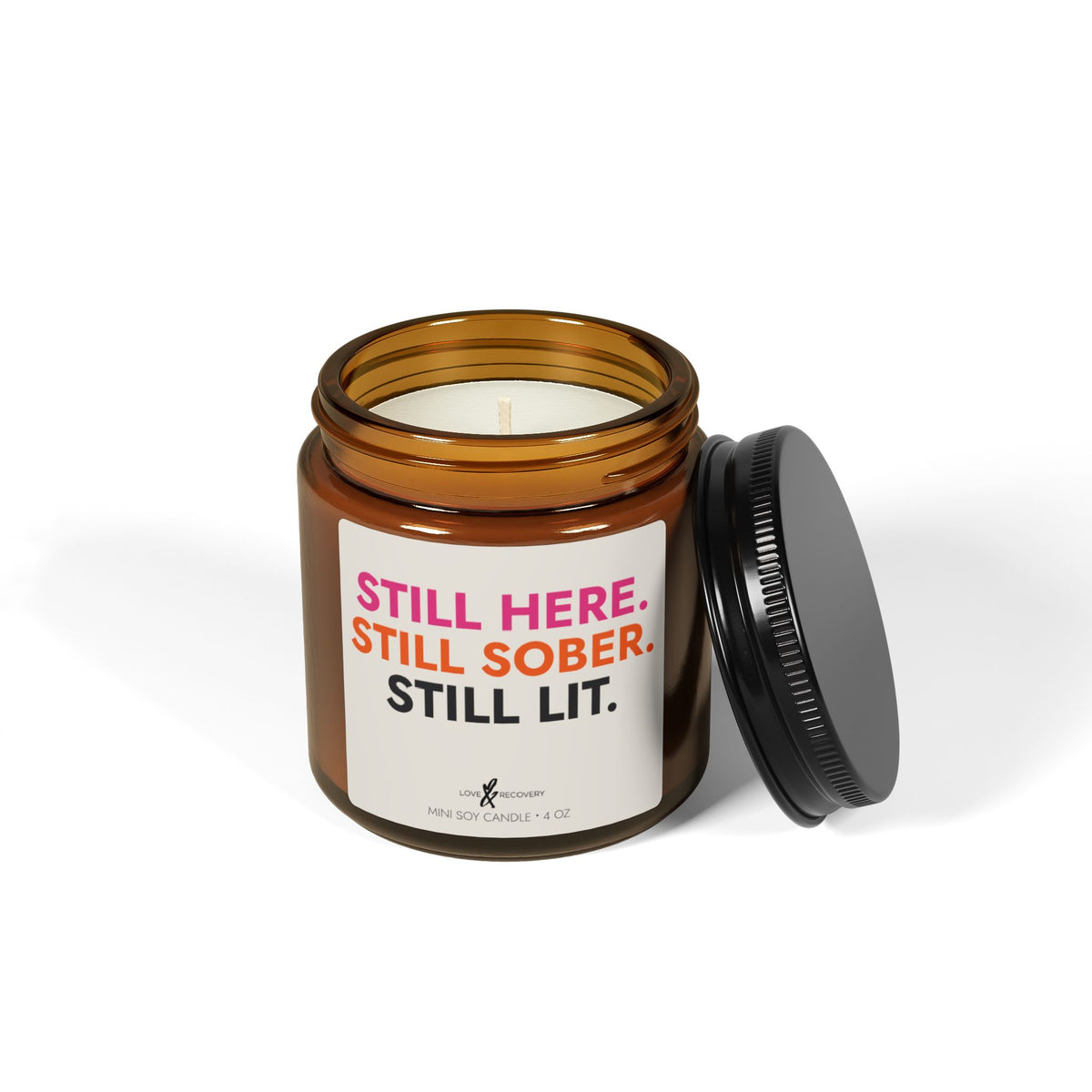 Sobriety candle, 4 oz jar with lid off on a white background, showing the wick and soy wax