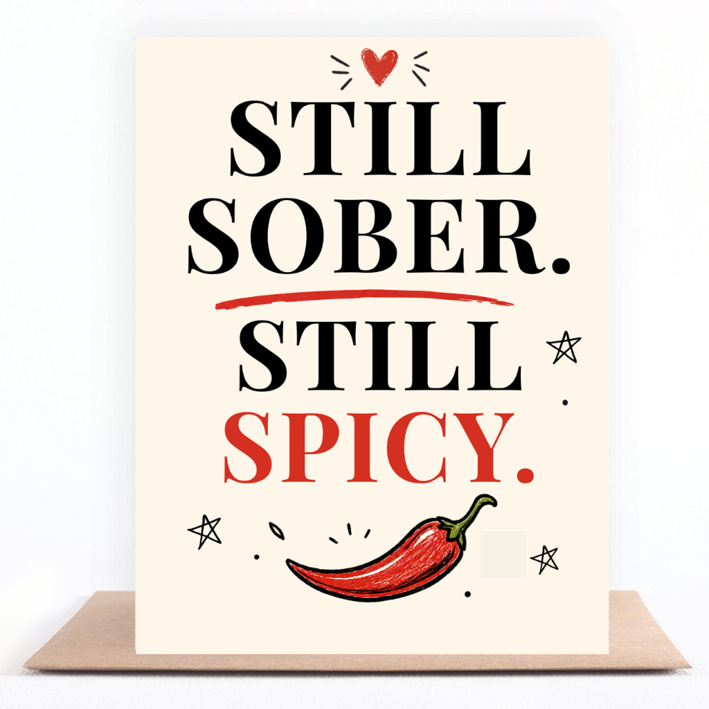 Black and red sobriety card reading “Still Sober. Still Spicy.” with a hand-drawn red chili pepper and kraft envelope.